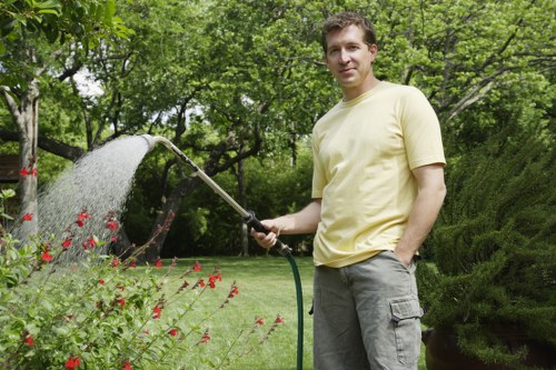 Person using a mobile device to access gardening service information