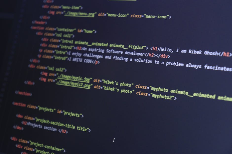 A close-up image of a computer screen displaying a code editor with HTML and CSS code, featuring tags such as <html>, <head>, <body>, and stylesheet links. The code is highlighted wi